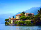 View of Villa del Balbianello building from Lake Como in Italy