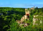 Rocamadour medieval town with lush vegetation in Lot, France