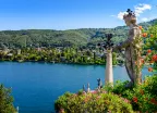 Isola Bella island and Lake Maggiore with statue and garden in Italy