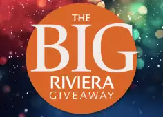 An orange circle with the words The Big Riviera Giveaway on it, with sparkling colours in the background