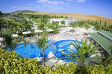 Outdoor swimming pool and garden at the Matera Hotel in Matera, Italy