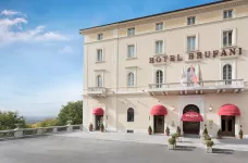 Exterior shot of the Hotel Brufani on a sunny day, located in Perugia, Italy.