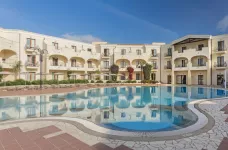 Exterior of Blu Hotel Morisco in Morisco Village with outdoor swimming pool, Cannigione, Italy