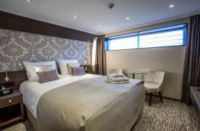 Interior of double bedroom aboard the Thomas Hardy ship
