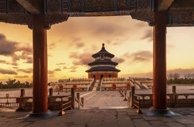 The Temple of Heaven, Tiantan, against a late sunset in Beijing, China.