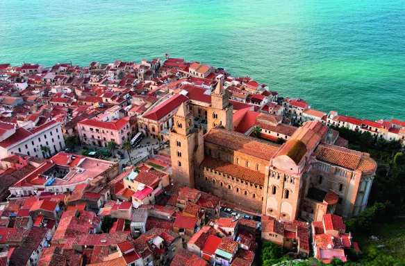 Aerial view of beautiful Mediterranean town, showcasing the Cathedral of Cefalù in Sicily, Italy