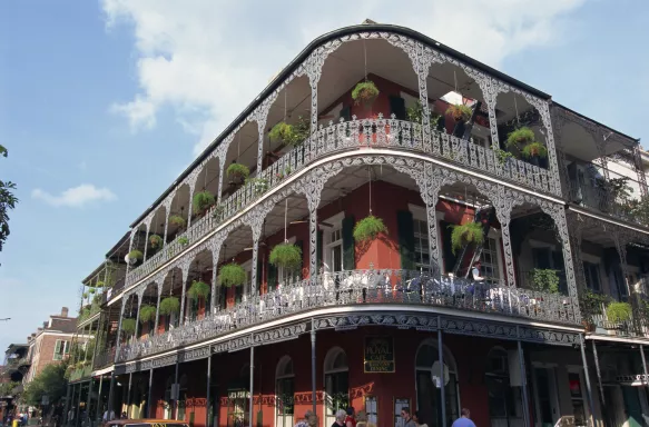 Exterior of the LaBranche House, traditional new orleans building featuring long balconies 