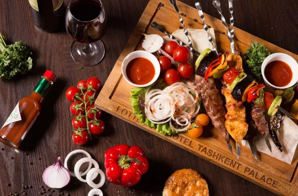 A charcuterie board, close-up of food and ingredients on wooden chopping board