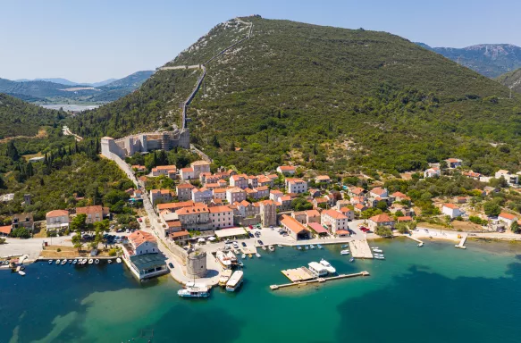 Aerial view of Mali Ston medieval old town and fortified wall in Croatia