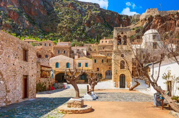Old houses and Elkomenos Christos church in ancient town, Peloponnese, Greece