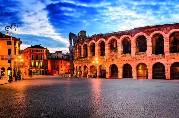 Piazza Bra and Roman Arena, "the Amphitheatre" at dusk in Verona, Italy