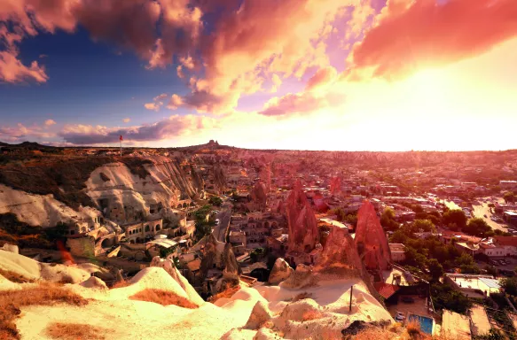 Ancient Göreme town and castle of Uçhisar at Sunset in Nevşehir, Turkey