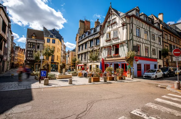 Street view of beautiful buildings and cafes in Rouen Old Town, Normandy, France