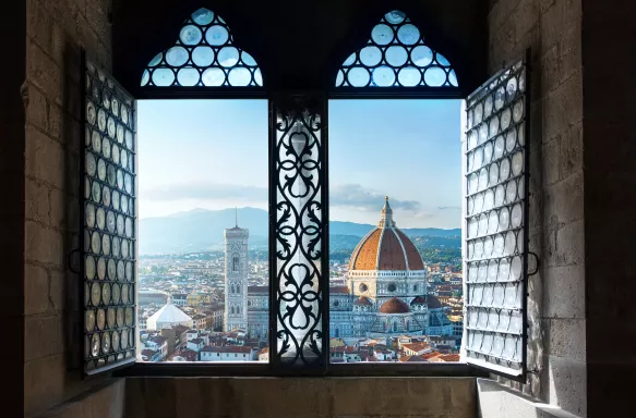 View out of an old window of Florence Cathedral and the surrounding city