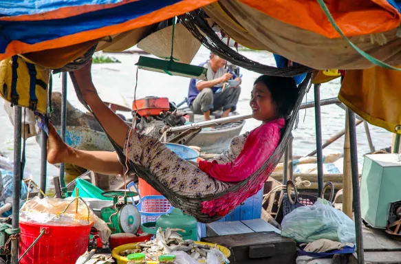 Young woman in hammock in Mekong Delta, Vietnam