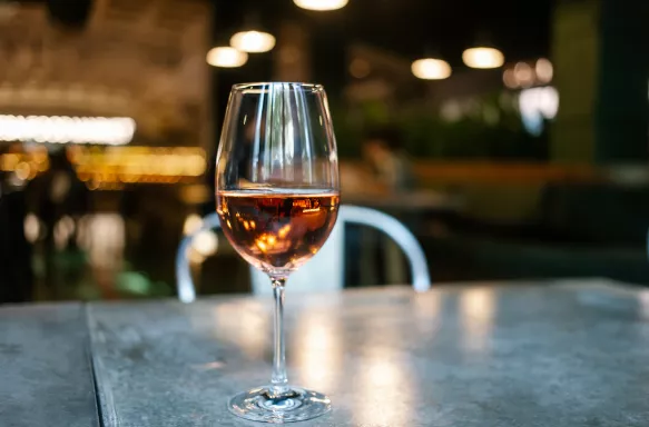 Glass of rose wine in restaurant setting