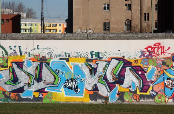 Graffiti wall and urbanscape in Berlin, Germany