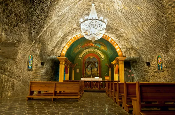 Chruch pews underground inside the Wieliczka Salt Mine cathedral 