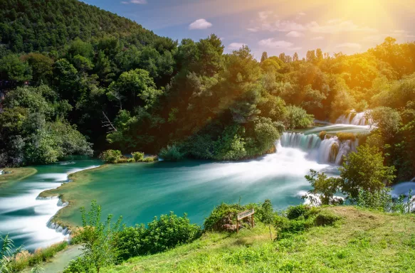 Sunlight beaming over the Krka waterfalls at Krka National Park in Dalmatia, Croatia