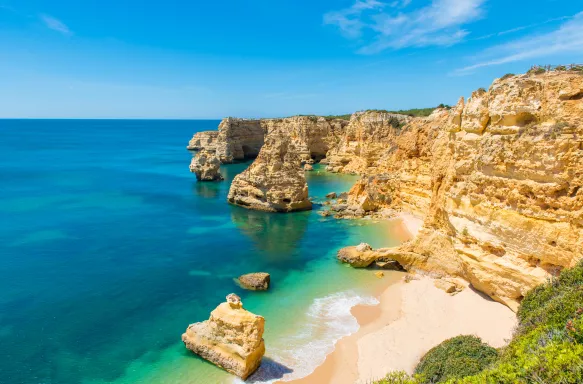 Beautiful beach coast, Praia da Marinha, with turquoise water in Algarve, Portugal