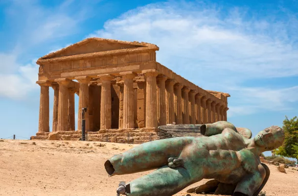 Fallen Statue of Icarus and Temple of Concordia, Valley of the Temples, Agrigento, Sicily, Italy