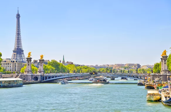 The Seine river with Alexandre III bridge and Eiffel Tower in the background