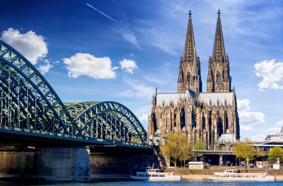 Cologne Cathedral and bridge on a beautiful summer day in Cologne, Germany