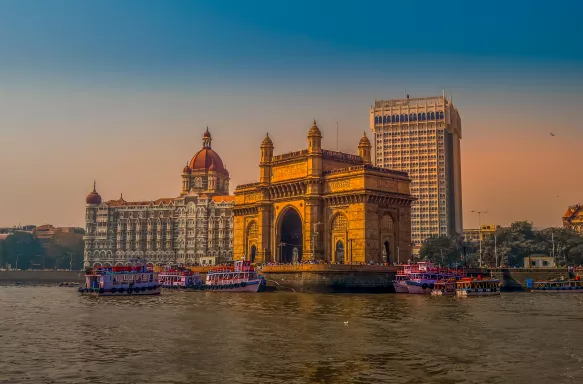 Gateway of India and the Mumbai harbour with ferries in Bombay, India