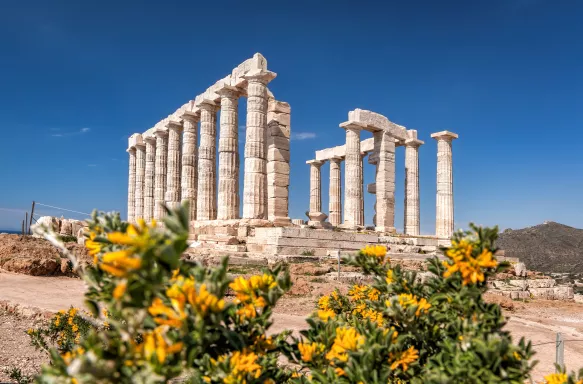 Cape Sounion with ruins of an ancient Greek temple of Poseidon in Attica, Greece