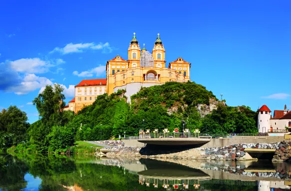 View of the Benedictine Melk Abbey and water reflections in Austria