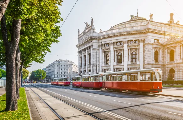 Wiener Ringstrasse with Burgtheater and tram at sunrise, Vienna, Austria
