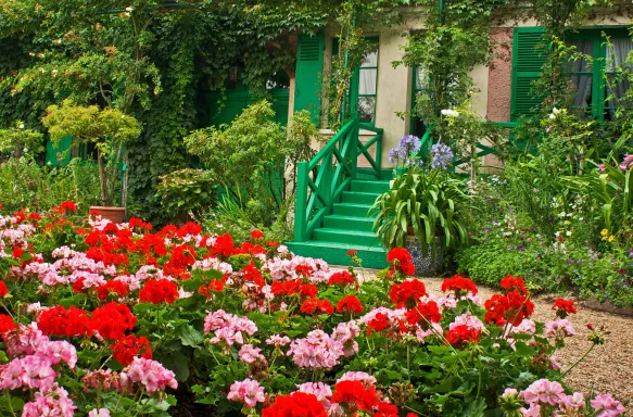 Front of Monet's House with colourful flowers in Giverny, France