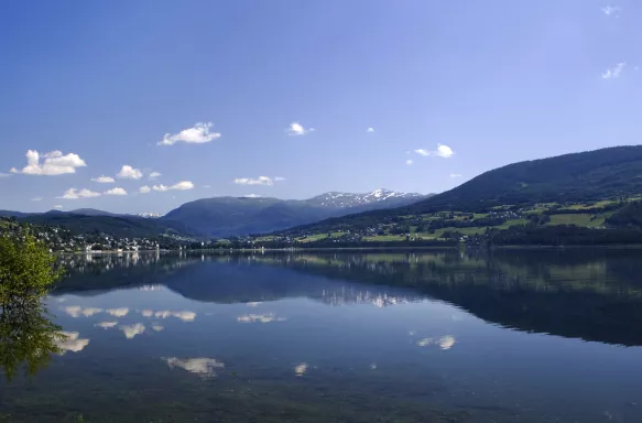 Vangsvatnet Lake reflecting the clear sky in Voss, Norway