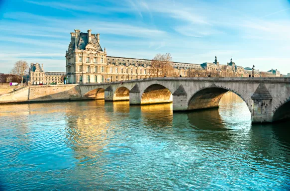 Pont Royal bridge spanning across the river Seine before the Louvre Museum