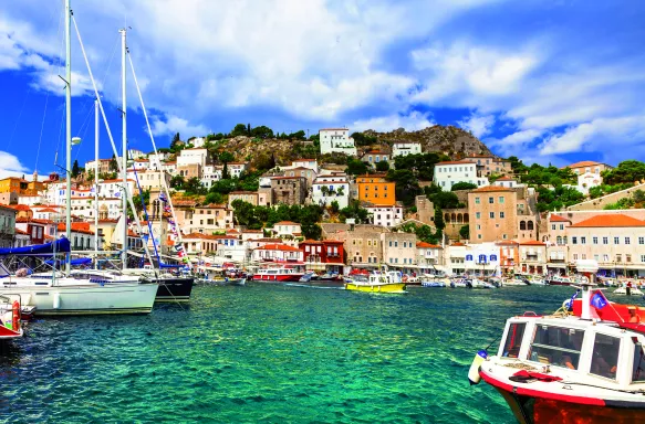 View of port with colourful boats on Hydra island in Saronic, Greece