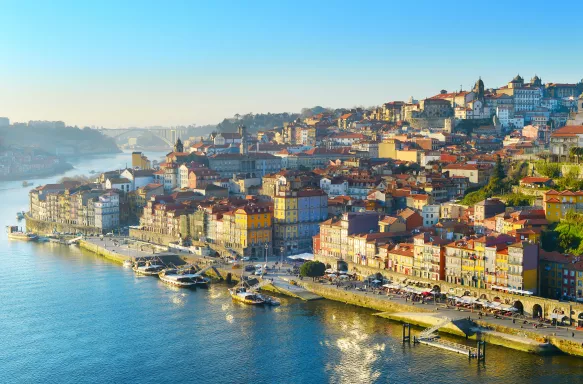 Aerial skyline shot of the colourful buildings in Porto Old Town in sunset light, Portugal.