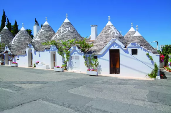 White houses with symbols in Alberobello, Puglia, Italy 