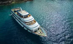 Yacht ship anchored in the crystal blue waters of a croatian bay