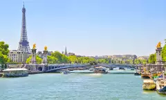The Seine river with Alexandre III bridge and Eiffel Tower in the background