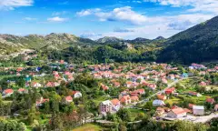 Aerial shot of country houses in Cetinje city, Montenegro