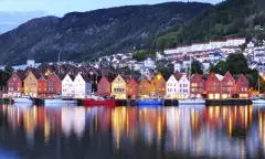 Colourful city of Bergen illuminated at night in Norway