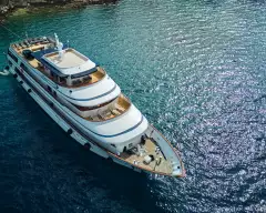 Yacht ship anchored in the crystal blue waters of a croatian bay