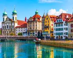 Colourful houses overlook the Reuss River in Lucerne, Switzerland