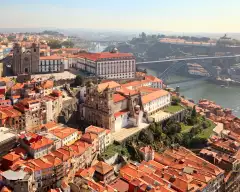 An aerial shot of the Porto Cathedrals next to the Douro River, Portugal