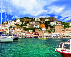 View of port with colourful boats on Hydra island in Saronic, Greece