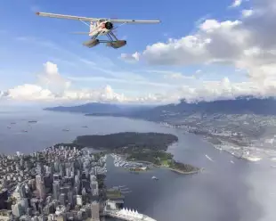 A seaplane flies over Vancouver, Canada