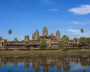 Angkor Wat temple complex being reflected in the water in Cambodia, Southern Asia