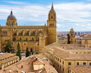 Aerial view of the city of Salamanca with its cathedral emerging from the roofs of the houses