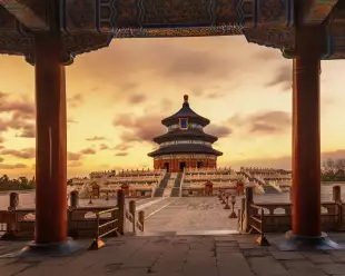 The Temple of Heaven, Tiantan, against a late sunset in Beijing, China.