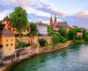The Old Town of Basel with red stone Munster cathedral and the Rhine river, Switzerland